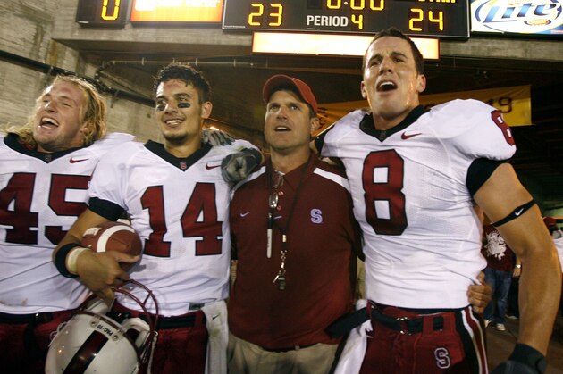 ** FILE ** In this Oct. 6, 2007 file photo, Stanford's Ben Ladner, Tavita Pritchard, coach Jim Harbaugh, and Evan Moore, from left, celebrate after Stanford upset Southern California 24-23 in an NCAA college football game in Los Angeles. Nobody around Southern California has forgotten the Stanford debacle of last year, when the 41-point underdog Cardinal handed the Trojans their only loss at Los Angeles Coliseum in the past 43 games. No. 6 USC, a 23-point favorite, gets a shot at revenge this weekend in Palo Alto. (AP Photo/Matt Sayles, File) ** FILE ** In this Oct. 6, 2007 file photo, Stanford's Ben Ladner, Tavita Pritchard, coach Jim Harbaugh, and Evan Moore, from left, celebrate after Stanford upset Southern California 24-23 in an NCAA college football game in Los Angeles. Nobody around Southern California has forgotten the Stanford debacle of last year, when the 41-point underdog Cardinal handed the Trojans their only loss at Los Angeles Coliseum in the past 43 games. No. 6 USC, a 23-point favorite, gets a shot at revenge this weekend in Palo Alto. (AP Photo/Matt Sayles, File)