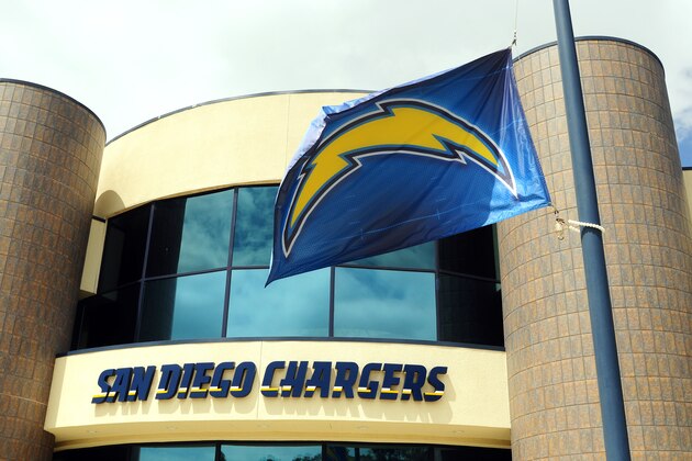 SAN DIEGO, CA - A small memorial for NFL legend Junior Seau rest at the foot of a flag pole flying the San Diego Chargers flag at half staff in front of the San Diego Chargers Practice Facitilty on May 3, 2012 in San Diego, California. (Photo by Kent C. Horner/Getty Images)