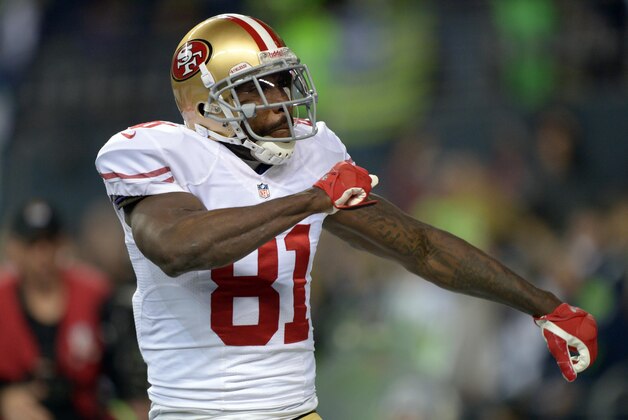 Jan 19, 2014; Seattle, WA, USA; San Francisco 49ers wide receiver Anquan Boldin (81) celebrates after catching a touchdown pass against the Seattle Seahawks in the third quarter of the 2013 NFC Championship football game at CenturyLink Field. Mandatory Credit: Kirby Lee-USA TODAY Sports