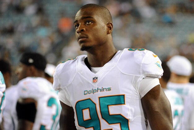 Aug 9, 2013; Jacksonville, FL, USA; Miami Dolphins defensive end Dion Jordan (95) during the game against the Jacksonville Jaguars at Everbank Field. Mandatory Credit: Melina Vastola-USA TODAY Sports
