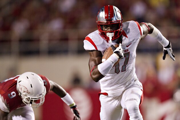 FAYETTEVILLE, AR - SEPTEMBER 22: Brandon Coleman #17 of the Rutgers Scarlet Knights runs the ball after catching a pass against the Arkansas Razorbacks at Razorback Stadium on September 22, 2012 in Fayetteville, Arkansas. The Scarlet Knights defeated the Razorbacks 35-26. (Photo by Wesley Hitt/Getty Images)