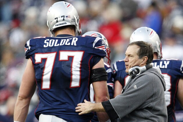 New England Patriots head coach Bill Belichick gives New England Patriots tackle Nate Solder (77) a pat on the back during the fourth quarter of an NFL football game against the Buffalo Bills in Foxborough, Mass., Sunday Jan. 1, 2012. The Patriots beat the Bills 49-21. (AP Photo/Elise Amendola) New England Patriots head coach Bill Belichick gives New England Patriots tackle Nate Solder (77) a pat on the back during the fourth quarter of an NFL football game against the Buffalo Bills in Foxborough, Mass., Sunday Jan. 1, 2012. The Patriots beat the Bills 49-21. (AP Photo/Elise Amendola)