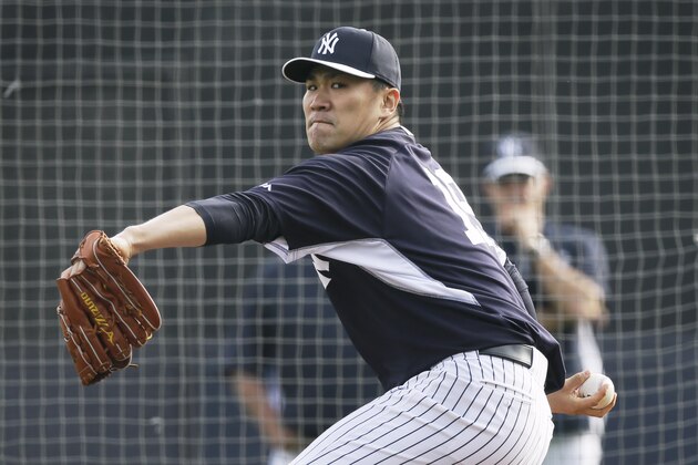 New York Yankees starting pitcher Masahiro Tanaka throws a pitch during spring training baseball practice Friday, Feb. 21, 2014, in Tampa, Fla. (AP Photo/Charlie Neibergall)