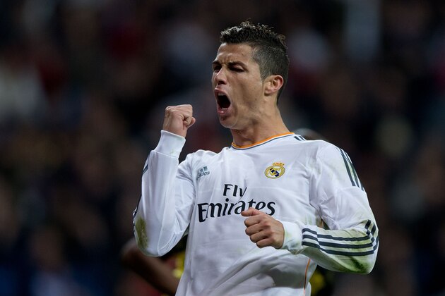 MADRID, SPAIN - OCTOBER 30:  Cristiano Ronaldo of Real Madrid CF celebrates scoring their third goal during the La Liga match between Real Madrid CF and Sevilla FC at Estadio Santiago Bernabeu on October 30, 2013 in Madrid, Spain.  (Photo by Gonzalo Arroyo Moreno/Getty Images)