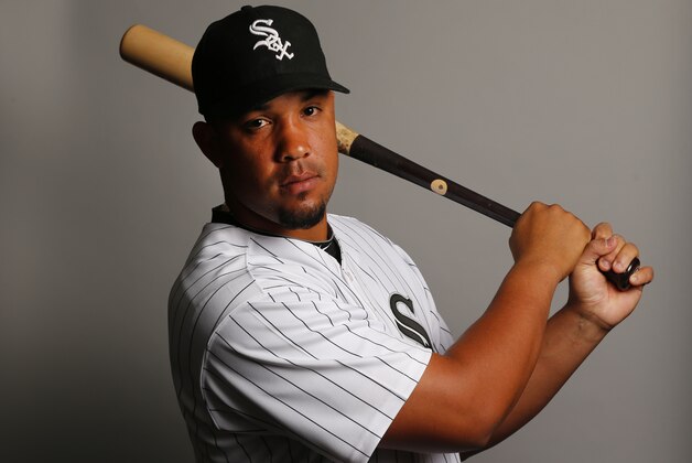Chicago White Sox Jose Abreu poses for his photograph during baseball spring training photo day Feb. 22, 2014 in Glendale, Ariz. (AP Photo/Paul Sancya)