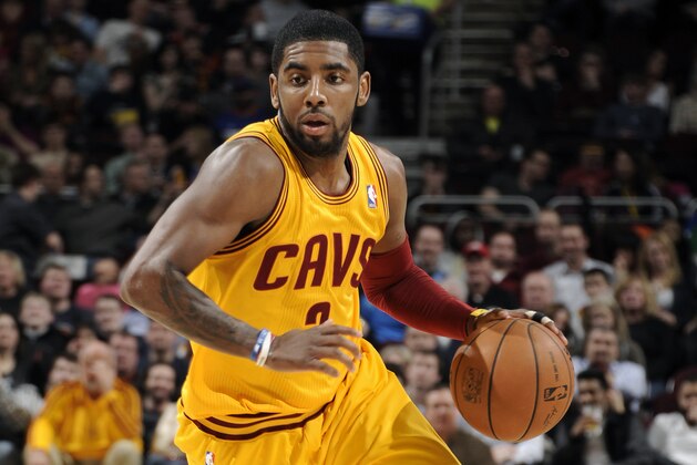 CLEVELAND, OH - FEBRUARY 28:  Kyrie Irving #2 of the Cleveland Cavaliers drives against the Utah Jazz at The Quicken Loans Arena on February 28, 2014 in Cleveland, Ohio. NOTE TO USER: User expressly acknowledges and agrees that, by downloading and/or using this Photograph, user is consenting to the terms and conditions of the Getty Images License Agreement. Mandatory Copyright Notice: Copyright 2014 NBAE (Photo by David Liam Kyle/NBAE via Getty Images)