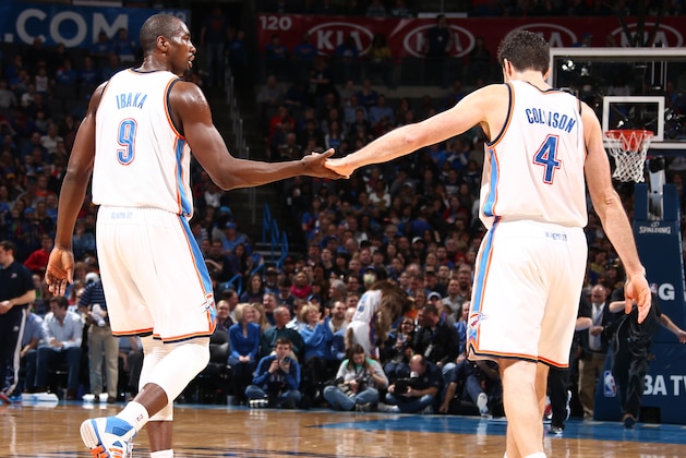 OKLAHOMA CITY, OK - FEBRUARY 23: Serge Ibaka #9 and Nick Collison #4 react during a game at Chesapeake Energy Arena on February 23, 2014 in Oklahoma City, Oklahoma. NOTE TO USER: User expressly acknowledges and agrees that, by downloading and/or using this photograph, user is consenting to the terms and conditions of the Getty Images License Agreement.  Mandatory Copyright Notice: Copyright 2014 NBAE (Photo by Nathaniel S. Butler/NBAE via Getty Images)