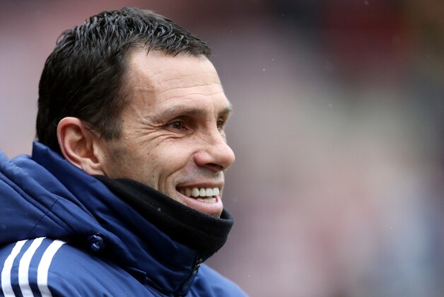 Sunderland's manager Gus Poyet looks on ahead of their English FA Cup fifth round soccer match against Southampton at the Stadium of Light, Sunderland, England, Saturday, Feb. 15, 2014. (AP Photo/Scott Heppell)