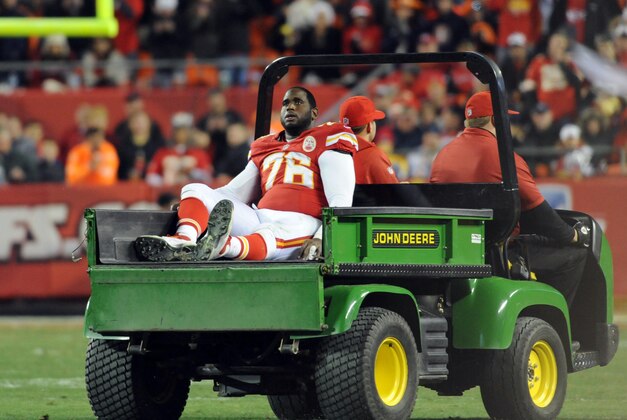 Dec 1, 2013; Kansas City, MO, USA; Kansas City Chiefs tackle Branden Albert (76) is carted off the field after an injury during the second half of the game against the Denver Broncos at Arrowhead Stadium. Denver won 35-28. Mandatory Credit: Denny Medley-USA TODAY Sports