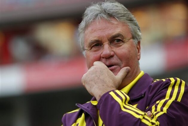 Anzhi Makhachkala's team coach Guus Hiddink looks on during the Europa League Qualifying phase soccer match between Anzhi Makhachkala and AZ Alkmaar at Lokomotiv stadium in Moscow,  Russia, Thursday, Aug. 23, 2012.(AP Photo/Alexander Zemlianichenko)