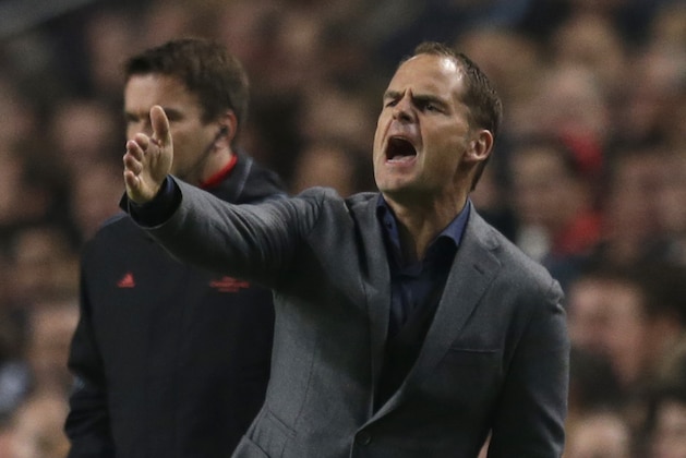 Ajax's coach Frank de Boer gestures during the Champions League Group H soccer match between Ajax Amsterdam and Celtic Glasgow at ArenA stadium in Amsterdam, Netherlands, Wednesday, Nov. 6, 2013. Ajax won the match with a 1-0 score. (AP Photo/Peter Dejong) Ajax's coach Frank de Boer gestures during the Champions League Group H soccer match between Ajax Amsterdam and Celtic Glasgow at ArenA stadium in Amsterdam, Netherlands, Wednesday, Nov. 6, 2013. Ajax won the match with a 1-0 score. (AP Photo/Peter Dejong)