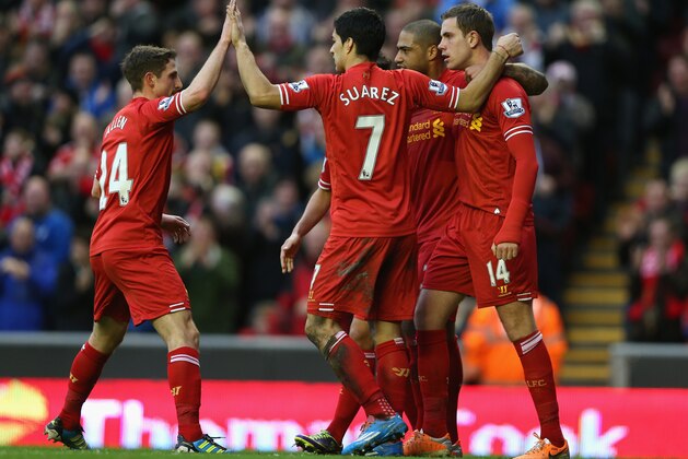 LIVERPOOL, ENGLAND - FEBRUARY 23: Jordan Henderson of Liverpool celebrates scoring hi team's fourth goal with his team-mates during the Barclays Premier League match between Liverpool and Swansea City at Anfield on February 23, 2014 in Liverpool, England. (Photo by Clive Brunskill/Getty Images) LIVERPOOL, ENGLAND - FEBRUARY 23: Jordan Henderson of Liverpool celebrates scoring hi team's fourth goal with his team-mates during the Barclays Premier League match between Liverpool and Swansea City at Anfield on February 23, 2014 in Liverpool, England. (Photo by Clive Brunskill/Getty Images)