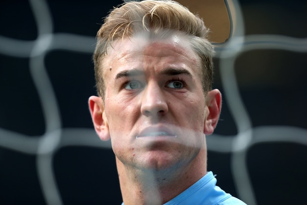Manchester City's goalkeeper Joe Hart looks on during his warm up session ahead of their English Premier League soccer match against Newcastle United at St James' Park, Newcastle, England, Sunday, Jan. 12, 2014. (AP Photo/Scott Heppell)