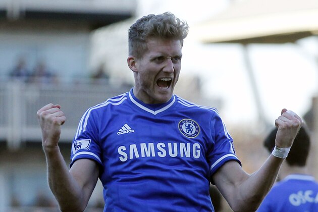 Chelsea's Andre Schurrle celebrates his goal against Fulham during their English Premier League soccer match at Craven Cottage, London, Saturday, March 1, 2014. (AP Photo/Sang Tan)