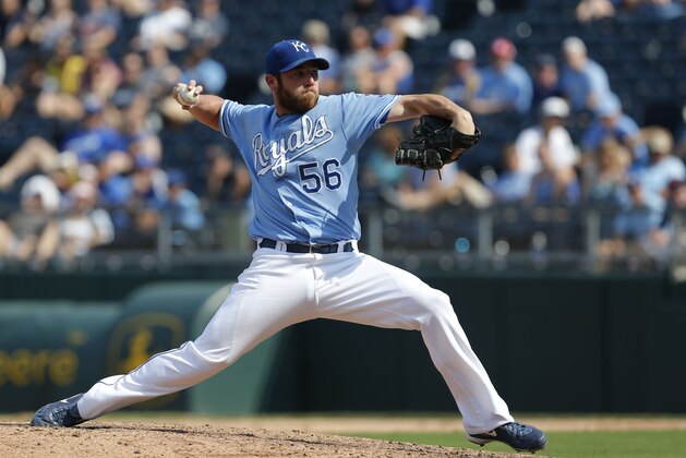 Kansas City Royals relief pitcher Greg Holland during a baseball game against the Detroit Tigers at Kauffman Stadium in Kansas City, Mo., Sunday, Sept. 8, 2013. The Royals defeated the Tigers 5-2. (AP Photo/Orlin Wagner)