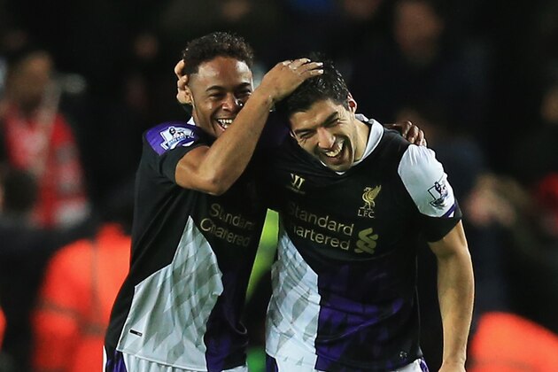 SOUTHAMPTON, ENGLAND - MARCH 01: Raheem Sterling (L) of Liverpool celebrates his goal with Luis Suarez during the Barclays Premier League match between Southampton and Liverpool at St Mary's Stadium on March 1, 2014 in Southampton, England.  (Photo by David Cannon/Getty Images)