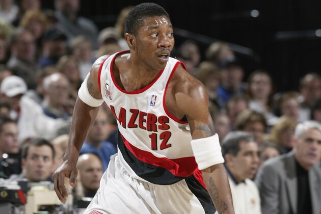 PORTLAND - APRIL 6:  Guard Erick Barkley #12 of the Portland Trail Blazers dribbles the ball during the NBA game against the Golden State Warriors at the Rose Garden in Portland, Oregon on April 6, 2002.  The Blazers won 113-86.  DIGITAL IMAGE  NOTE TO USER: User expressly acknowledges and agrees that, by downloading and/or using this Photograph, User is consenting to the terms and conditions of the Getty Images License Agreement.  Copyright 2002 NBAE (Photo by Sam Forencich/NBAE/Getty Images)