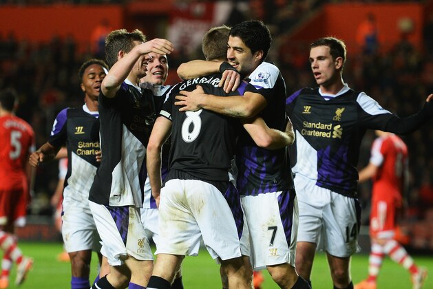 SOUTHAMPTON, ENGLAND - MARCH 01:  Luis Suarez of Liverpool celebrates Steven Gerrard's penalty during the Barclays Premier League match between Southampton and Liverpool at St Mary's Stadium on March 1, 2014 in Southampton, England.  (Photo by Mike Hewitt/Getty Images)