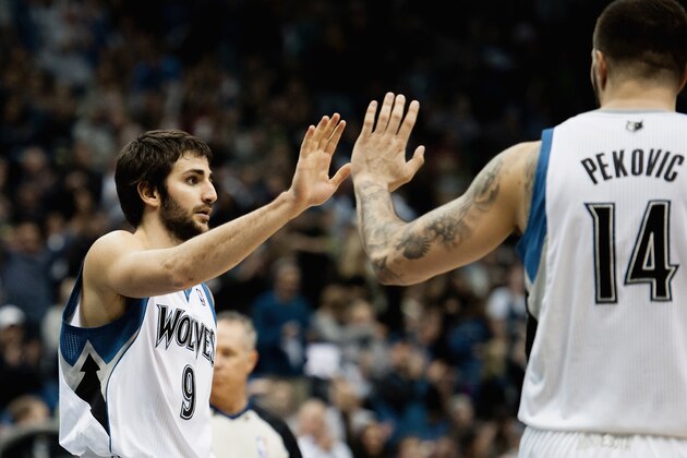 MINNEAPOLIS, MN - OCTOBER 30: Ricky Rubio #9 and Nikola Pekovic #14 of the Minnesota Timberwolves celebrate a play during the game against the Orlando Magic on October 30, 2013 at Target Center in Minneapolis, Minnesota. NOTE TO USER: User expressly acknowledges and agrees that, by downloading and or using this Photograph, user is consenting to the terms and conditions of the Getty Images License Agreement. (Photo by Hannah Foslien/Getty Images)