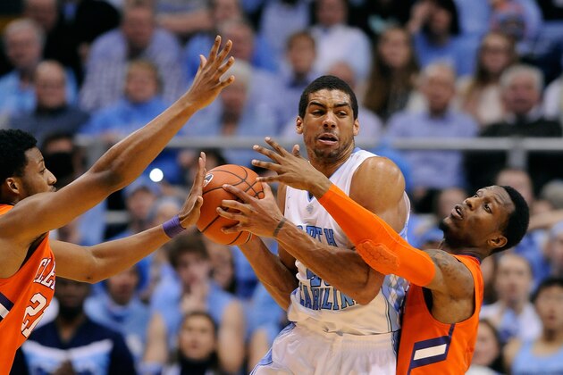 CHAPEL HILL, NC - JANUARY 26: Damarcus Harrison #21 and Adonis Filer #3 of the Clemson Tigers defend James Michael McAdoo #43 of the North Carolina Tar Heels during their game at the Dean Smith Center on January 26, 2014 in Chapel Hill, North Carolina. North Carolina won 80-61. (Photo by Grant Halverson/Getty Images) CHAPEL HILL, NC - JANUARY 26: Damarcus Harrison #21 and Adonis Filer #3 of the Clemson Tigers defend James Michael McAdoo #43 of the North Carolina Tar Heels during their game at the Dean Smith Center on January 26, 2014 in Chapel Hill, North Carolina. North Carolina won 80-61. (Photo by Grant Halverson/Getty Images)