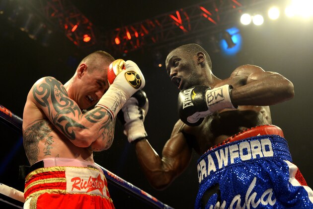 GLASGOW, SCOTLAND - MARCH 1 : Ricky Burns and Terence Crawford clash during the WBO World Lightweight Championship Boxing match at the Glasgow SECC on March 1 2014 in Glasgow, Scotland. (Photo by Mark Runnacles/Getty Images)