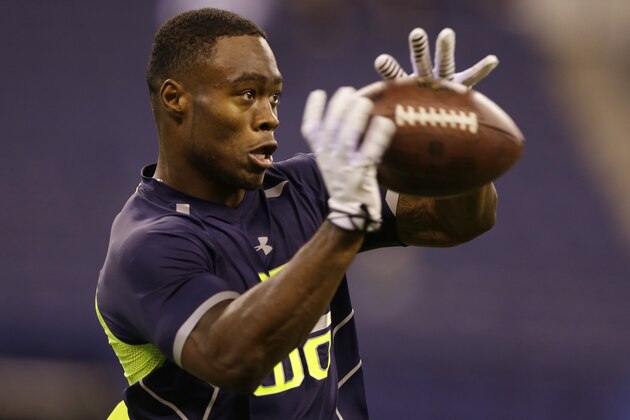 Oregon State wide receiver Brandin Cooks makes a catch as he runs a drill at the NFL football scouting combine in Indianapolis, Sunday, Feb. 23, 2014. (AP Photo/Michael Conroy)