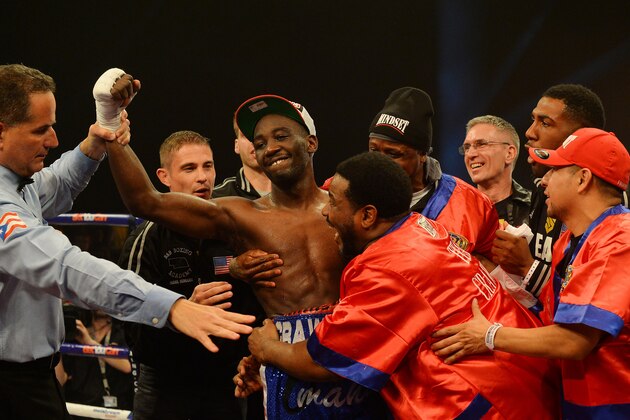 GLASGOW, SCOTLAND - MARCH 1 :  Terence Crawford celebrates his victory over Rick Burns during the WBO World Lightweight Championship Boxing match at the Glasgow SECC on March 1 2014 in Glasgow, Scotland. (Photo by Mark Runnacles/Getty Images)