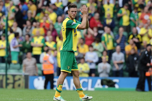 NORWICH, ENGLAND - AUGUST 17:  Ricky van Wolfswinkel of Norwich City applauds the fans at the end of the Barclays Premier League match between Norwich City and Everton at Carrow Road on August 17, 2013 in Norwich, England.  (Photo by Tony Marshall/Getty Images)