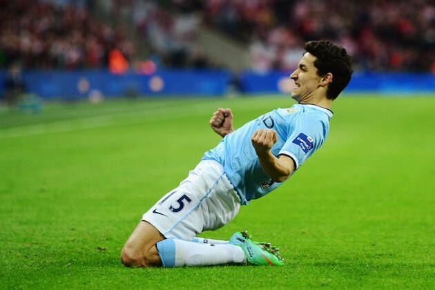 LONDON, ENGLAND - MARCH 02:  Jesus Navas of Manchester City celebrates after scoring his team's third goal during the Capital One Cup Final between Manchester City and Sunderland at Wembley Stadium on March 2, 2014 in London, England.  (Photo by Jamie McDonald/Getty Images)