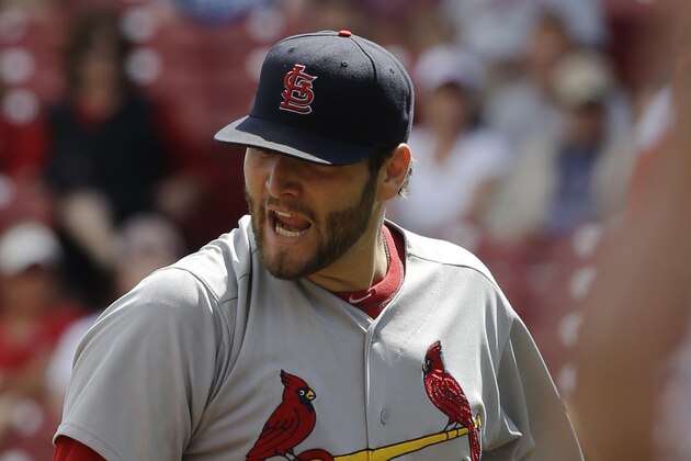 St. Louis Cardinals starting pitcher Lance Lynn reacts at the end of the eighth inning of a baseball game against the Cincinnati Reds, Sunday, Aug. 4, 2013, in Cincinnati. Lynn was the winning pitcher in the game won by St. Louis 15-2. (AP Photo/Al Behrman)