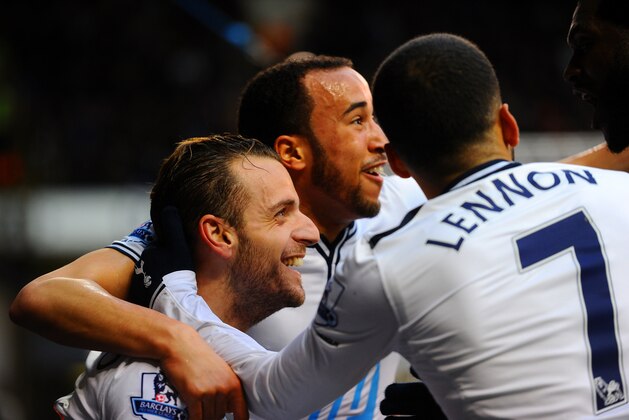 LONDON, ENGLAND - MARCH 02:  Roberto Soldado of Tottenham Hotspur celebrates scoring the opening goal with Andros Townsend and Aaron Lennon of Tottenham Hotspur during the Barclays Premier League match between Tottenham Hotspur and Cardiff City at White Hart Lane on March 2, 2014 in London, England.  (Photo by Mike Hewitt/Getty Images)