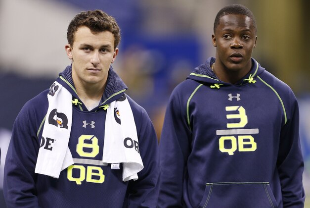 Feb 23, 2014; Indianapolis, IN, USA; Texas A&M quarterback Johnny Manziel (L) and Louisville Cardinals quarterback Teddy Bridgewater (R) look on during the 2014 NFL Combine at Lucas Oil Stadium. Mandatory Credit: Brian Spurlock-USA TODAY Sports Feb 23, 2014; Indianapolis, IN, USA; Texas A&M quarterback Johnny Manziel (L) and Louisville Cardinals quarterback Teddy Bridgewater (R) look on during the 2014 NFL Combine at Lucas Oil Stadium. Mandatory Credit: Brian Spurlock-USA TODAY Sports