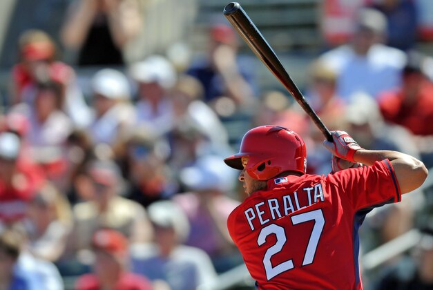 Mar 1, 2014; Jupiter, FL, USA; St. Louis Cardinals shortstop Jhonny Peralta (27) at bat against the Miami Marlins Roger Dean Stadium. Mandatory Credit: Steve Mitchell-USA TODAY Sports