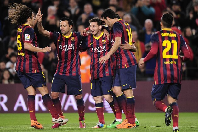 FC Barcelona's Lionel Messi, from Argentina, center, reacts after scoring with his teammates against Almeria during a Spanish La Liga soccer match at the Camp Nou stadium in Barcelona, Spain, Sunday, March 2, 2014. (AP Photo/Manu Fernandez) FC Barcelona's Lionel Messi, from Argentina, center, reacts after scoring with his teammates against Almeria during a Spanish La Liga soccer match at the Camp Nou stadium in Barcelona, Spain, Sunday, March 2, 2014. (AP Photo/Manu Fernandez)