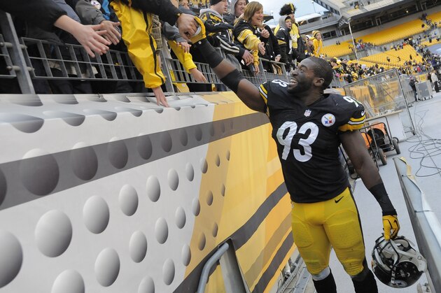 Pittsburgh Steelers outside linebacker Jason Worilds (93) greets fans after an NFL football game against the Buffalo Bills, Sunday, Nov. 10, 2013, in Pittsburgh. Pittsburgh won 23-10. (AP Photo/Don Wright)