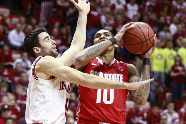 Indiana forward Will Sheehey, left, fouls Ohio State forward LaQuinton Ross as Ross goes to the basket in the first half of an NCAA basketball game in Bloomington, Ind. Sunday, March 2, 2014. (AP Photo/R Brent Smith) Indiana forward Will Sheehey, left, fouls Ohio State forward LaQuinton Ross as Ross goes to the basket in the first half of an NCAA basketball game in Bloomington, Ind. Sunday, March 2, 2014. (AP Photo/R Brent Smith)