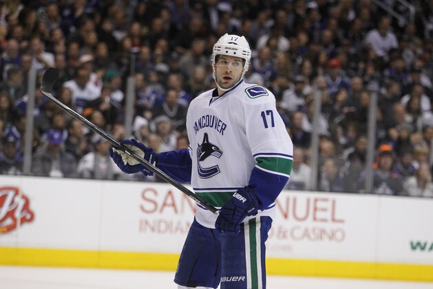 Vancouver Canucks center Ryan Kesler (17) readies for a face-off against the Los Angeles Kings during the first period of Game 3 in a first-round NHL Stanley Cup playoff series in Los Angeles, Sunday, April 15, 2012.  (AP Photo/Alex Gallardo)