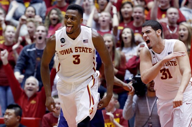 AMES, IA - FEBRUARY 8:  Melvin Ejim #3 of the Iowa State Cyclones and teammate Georges Niang #31 react after Ejim dunked the ball in the second half of play against TCU at Hilton Coliseum on February 8, 2014 in Ames, Iowa. Melvin Ejim #3 of the Iowa State Cyclones had 48 total points for the game, 33 were scored in the second half. Iowa State defeated TCU 84-69. (Photo by David Purdy/Getty Images)