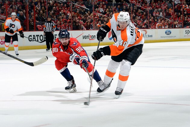 WASHINGTON, DC - MARCH 02:  Vincent Lecavalier #40 of the Philadelphia Flyers shoots and scores the game winning goal in overtime against the Washington Capitals at the Verizon Center on March 2, 2014 in Washington, DC. Philadelphia won the game 5-4. (Photo by Greg Fiume/NHLI via Getty Images)