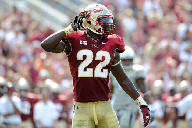 Sep 14, 2013; Tallahassee, FL, USA; Florida State Seminoles linebacker Telvin Smith (22) during the first half of the game at Doak Campbell Stadium. Mandatory Credit: Melina Vastola-USA TODAY Sports
