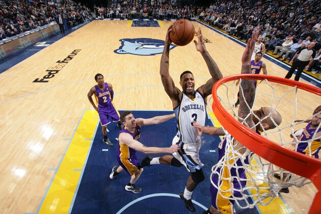 MEMPHIS, TN - FEBRUARY 26: James Johnson #3 of the Memphis Grizzlies dunks against the Los Angeles Lakers on February 26, 2014 at FedExForum in Memphis, Tennessee. NOTE TO USER: User expressly acknowledges and agrees that, by downloading and or using this photograph, User is consenting to the terms and conditions of the Getty Images License Agreement. Mandatory Copyright Notice: Copyright 2014 NBAE (Photo by Joe Murphy/NBAE via Getty Images)