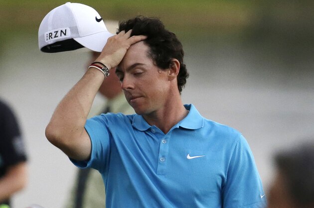 Rory McIlroy, of Northern Ireland, walks off the 18th green after losing in the four-man playoff in the final round of the Honda Classic golf tournament, Sunday, March 2, 2014, in Palm Beach Gardens, Fla. Russell Henley won the tournament. (AP Photo/Lynne Sladky)