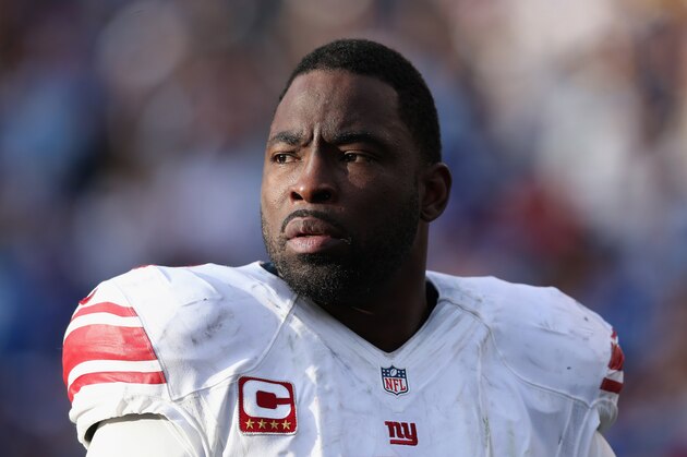 SAN DIEGO, CA - DECEMBER 08:  Justin Tuck #91 of the New York Giants looks on against the San Diego Chargers at Qualcomm Stadium on December 8, 2013 in San Diego, California.  (Photo by Jeff Gross/Getty Images)