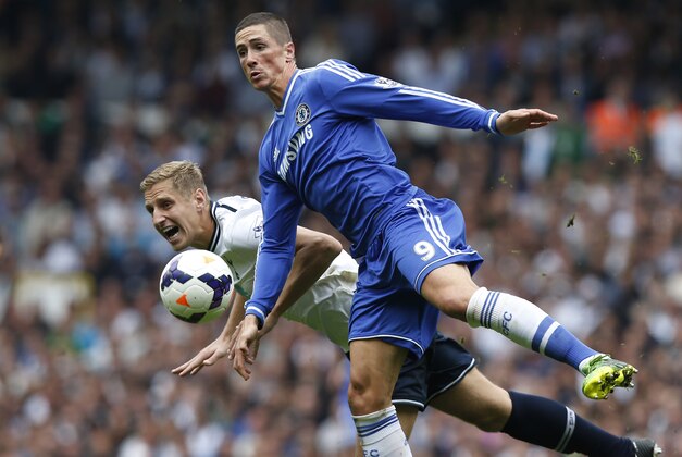 Chelsea's Fernando Torres, right, competes with Tottenham Hotspur's Michael Dawson during their English Premier League soccer match at White Hart Lane, London, Saturday, Sept. 28, 2013. (AP Photo/Sang Tan) Chelsea's Fernando Torres, right, competes with Tottenham Hotspur's Michael Dawson during their English Premier League soccer match at White Hart Lane, London, Saturday, Sept. 28, 2013. (AP Photo/Sang Tan)