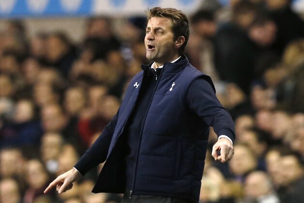 Tottenham Hotspur's manager Tim Sherwood calls out to his players as he watches his team play against Cardiff City during their English Premier League soccer match at White Hart Lane, London, Sunday, March 2, 2014. (AP Photo/Sang Tan)