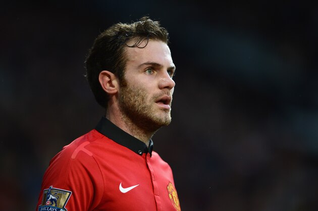MANCHESTER, ENGLAND - FEBRUARY 09:  Juan Mata of Manchester United looks on during the Barclays Premier League match between Manchester United and Fulham at Old Trafford on February 9, 2014 in Manchester, England.  (Photo by Michael Regan/Getty Images)