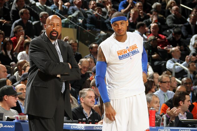 NEW YORK, NY - FEBRUARY 4:  Mike Woodson and Carmelo Anthony #7 of the New York Knicks stand on the sideline during the game against the Detroit Pistons on February 4, 2013 at Madison Square Garden in New York City.  NOTE TO USER: User expressly acknowledges and agrees that, by downloading and or using this photograph, User is consenting to the terms and conditions of the Getty Images License Agreement. Mandatory Copyright Notice: Copyright 2013 NBAE  (Photo by Nathaniel S. Butler/NBAE via Getty Images)