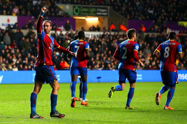 SWANSEA, WALES - MARCH 02:  Glenn Murray of Crystal Palace celebrates scoring the equalising goal from the penalty spot during the Barclays Premier League match between Swansea City and Crystal Palace at Liberty Stadium on March 2, 2014 in Swansea, Wales.  (Photo by Jan Kruger/Getty Images)