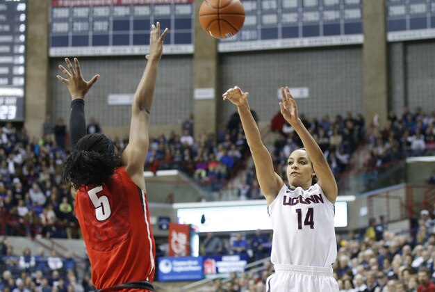 Mar 1, 2014; Storrs, CT, USA; Connecticut Huskies guard Bria Hartley (14) shoots over Rutgers Scarlet Knights guard Precious Person (5) in the first half at Gampel Pavilion. Mandatory Credit: David Butler II-USA TODAY Sports Mar 1, 2014; Storrs, CT, USA; Connecticut Huskies guard Bria Hartley (14) shoots over Rutgers Scarlet Knights guard Precious Person (5) in the first half at Gampel Pavilion. Mandatory Credit: David Butler II-USA TODAY Sports