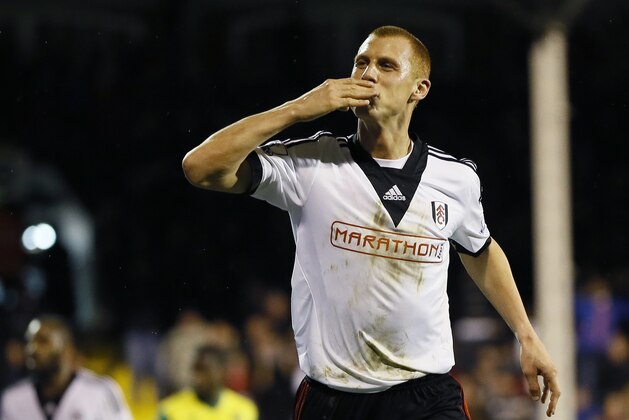 Fulham's Steve Sidwell celebrates scoring a goal during the English FA Cup 3rd round replay soccer match between Fulham and Norwich City at Craven Cottage stadium in London, Tuesday, Jan. 14, 2014. (AP Photo/Kirsty Wigglesworth) Fulham's Steve Sidwell celebrates scoring a goal during the English FA Cup 3rd round replay soccer match between Fulham and Norwich City at Craven Cottage stadium in London, Tuesday, Jan. 14, 2014. (AP Photo/Kirsty Wigglesworth)
